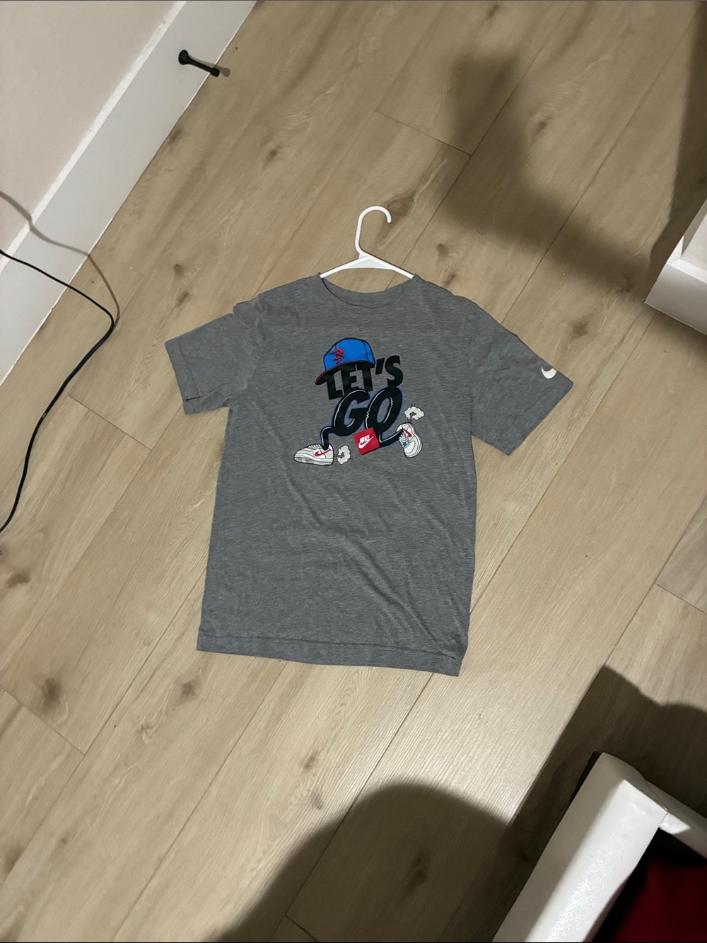 Nike Gray Short Sleeve 'Let's Go' Graphic Tee with Blue & Red Accents